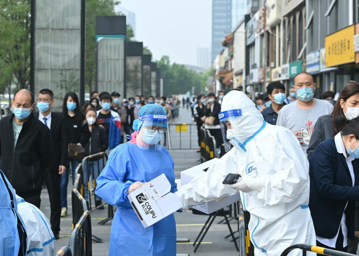 广州疫情警示与杭州精准防御，双城记下的中国防疫新常态